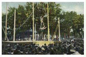 (Image: Trapeze Acrobats on a Raised Stage)
