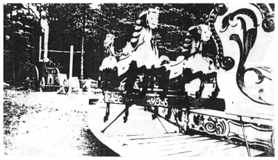 (Image: The Power Source is seen past a row of Carousel Horses)