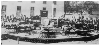(Image: Early `Carry-Us-All' Carousel seen at the Parker
  Factory Grounds)