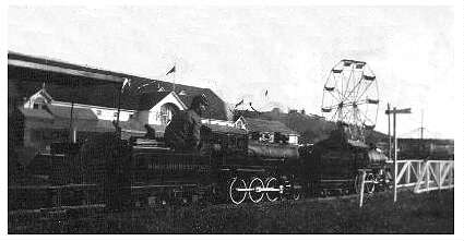 (Image: Two trains and a Ferris Wheel)