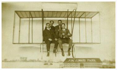 (Image: Four Men pose on an Airplane Set)