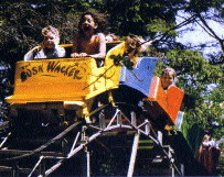 (Image Left: Young Riders crest a hill on the `Bushwacker' Coaster)