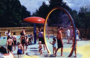 (Image Left: Water-Seekers enjoy the Pool on a Hot Day)