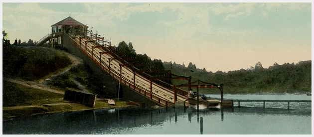 (Image: A Boat Exits the Bottom of the Ramp, Splashing Up Water)