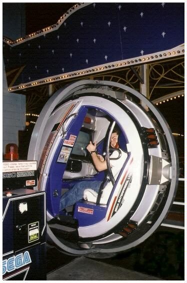 (Image: a Rider Enjoys an Arcade Game)