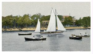 (Image: Sailboats and Canoes on the Water)