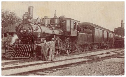 (Image: An Engineer and Fireman Pose by their Locomotive)